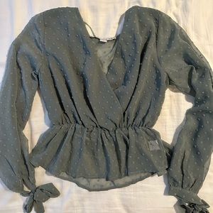 Blouse with bow tie sleeves